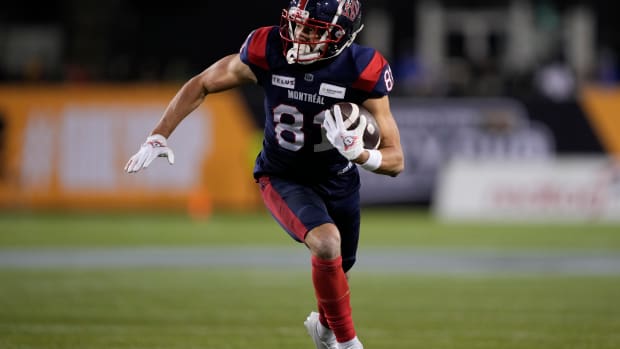 Nov 19, 2023; Hamilton, Ontario, CAN; Montreal Alouettes wide receiver Austin Mack (81) scores a touchdown against the Winnipeg Blue Bombers during the 110th Grey Cup at Tim Hortons Field. Mandatory Credit: John E. Sokolowski-USA TODAY Sports  